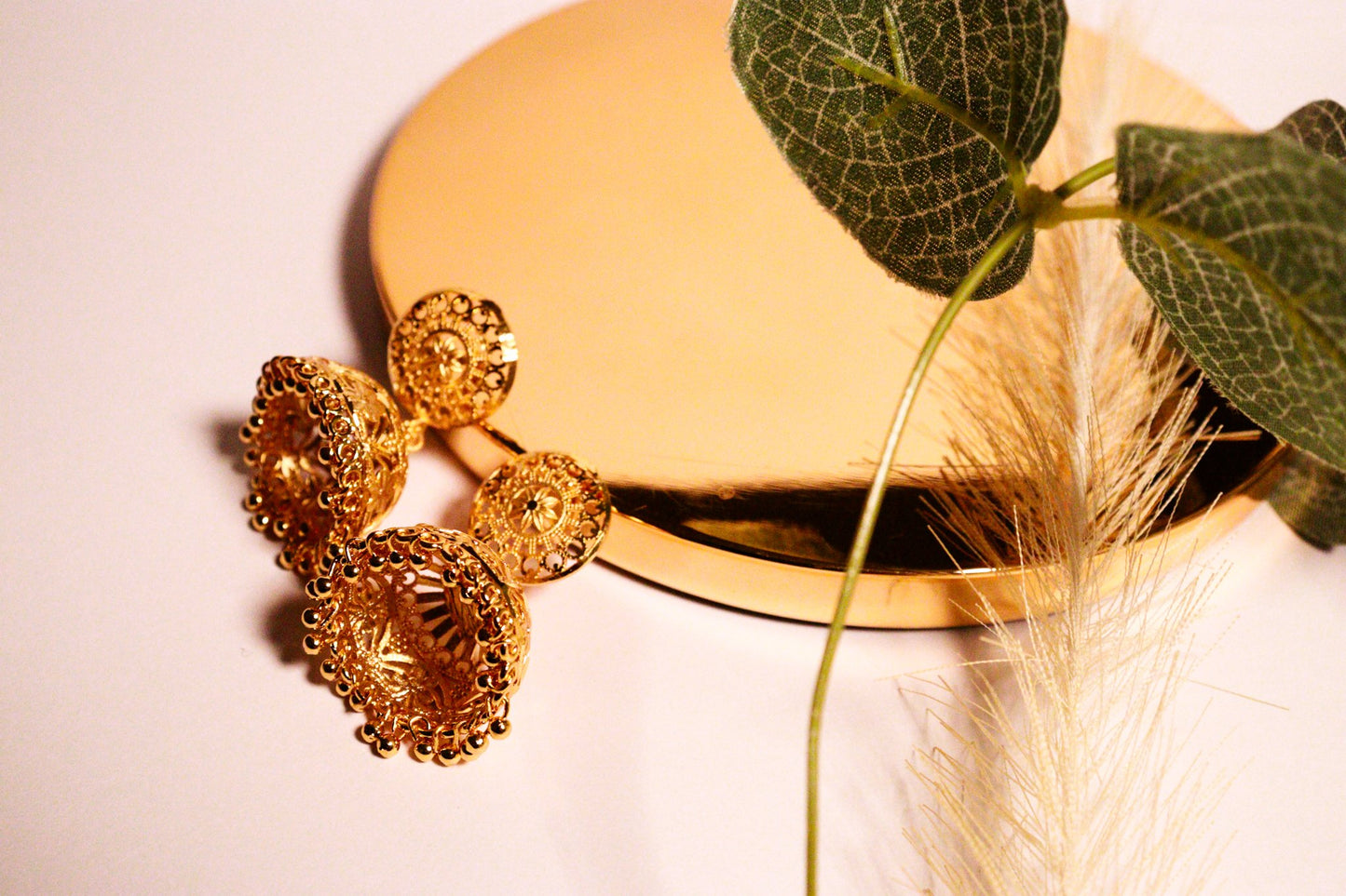 Gold Jhumkas - Traditional & Festive Essence